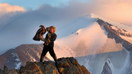 With an eagle.