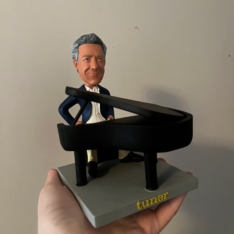 Dustin Hoffman Bobblehead at a piano.