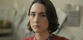 Saorsie Ronan, scowling.