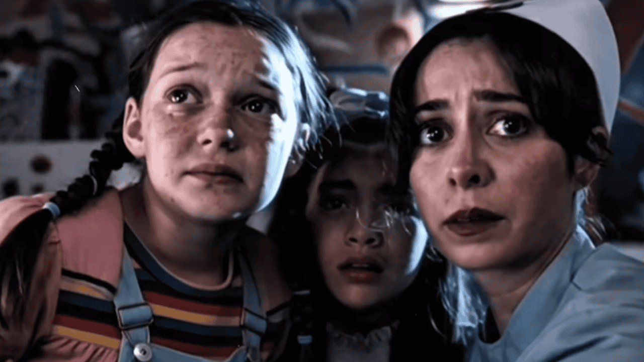 Mother, daughter, third girl, all looking worried.