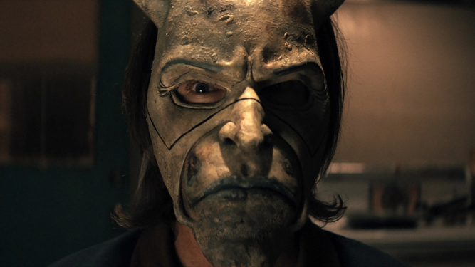 Mask by Tom Savini.